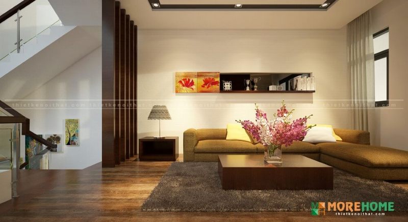 Mẫu sofa chữ L chọn vải cho phòng khách nhà phố đẹphiện đại với tông màu nâu sáng là điểm nhấn mang lại không gian ấm cúng